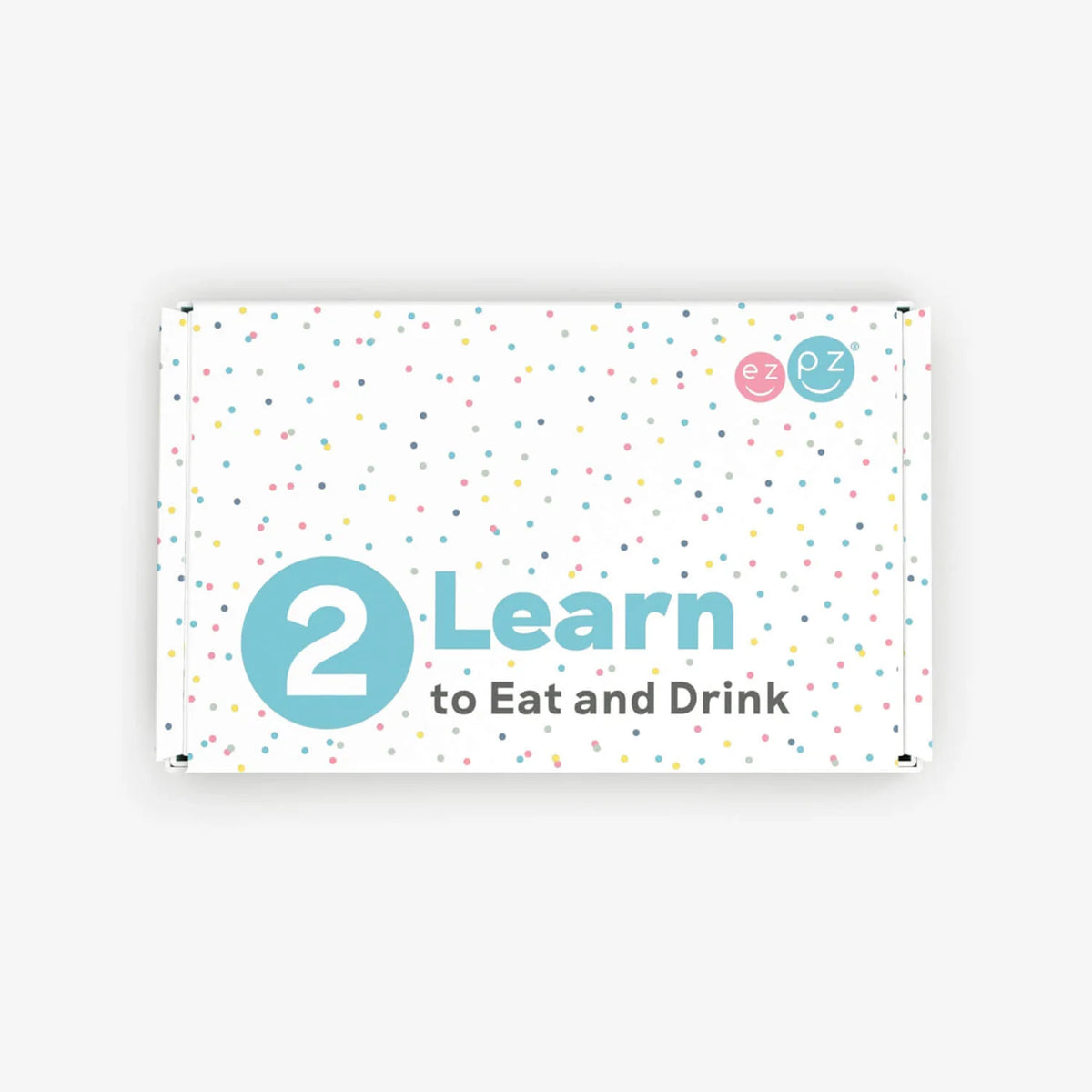 Product packaging with '2 Learn to Eat and Drink' text on a white background
