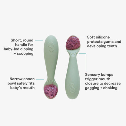 Two baby spoons with text describing their features on a white background